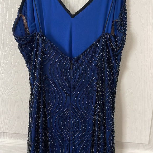 Beautiful formal beaded dress. Navy blue with a split on the front of the dress. - Picture 7 of 11
